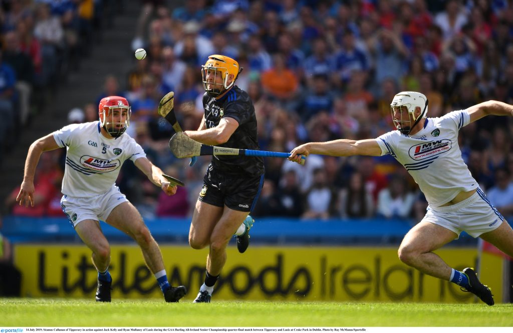 14 July 2019; Séamus Callanan of Tipperary in action against Jack Kelly and Ryan Mullaney of Laois during the GAA Hurling All-Ireland Senior Championship quarter-final match between Tipperary and Laois at Croke Park in Dublin. Photo by Ray McManus/Sportsfile